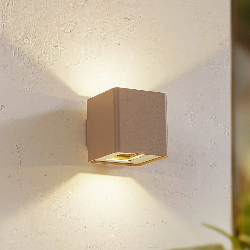 lampenwelt Lucande LED-Außenwandleuchte Aaron beige IP54 up/down
